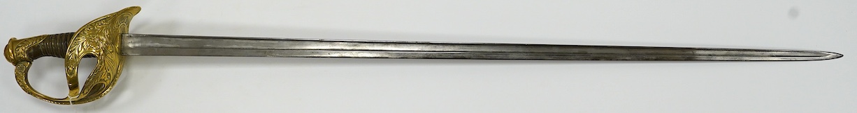 A French 1890 Cuirassier’s sword, brass boat shaped guard with foliage in relief, wirebound horn grip 'Medusa's Head Motif' to thumb scroll, blade 92.5cm. Condition - good
